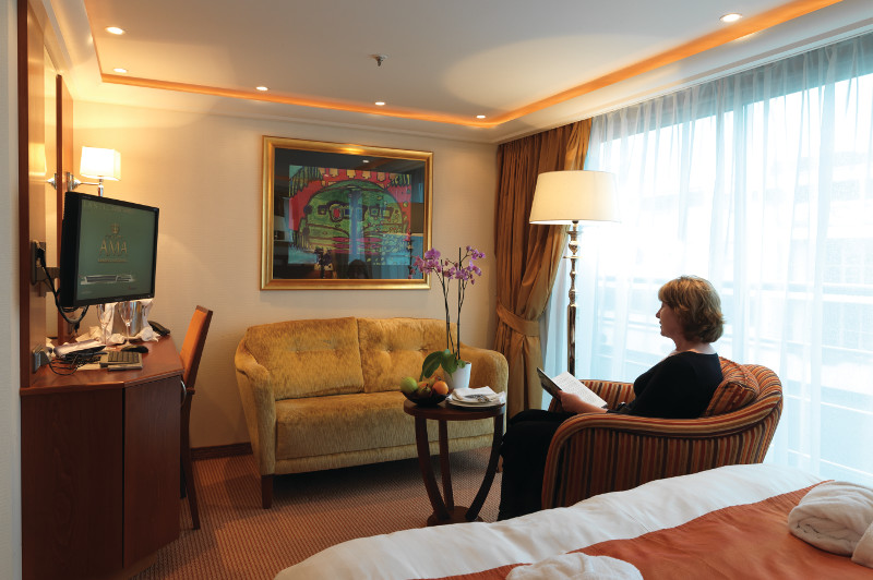 woman sitting in river cruise boat suite