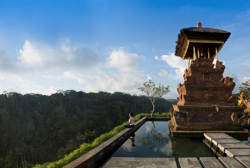 Zen Capital Of Bali: Woman admiring view over Bali valley.