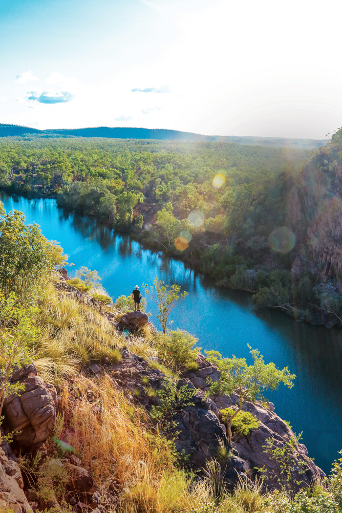 a hiker stands over the main gorge of Nitmiluk National Park