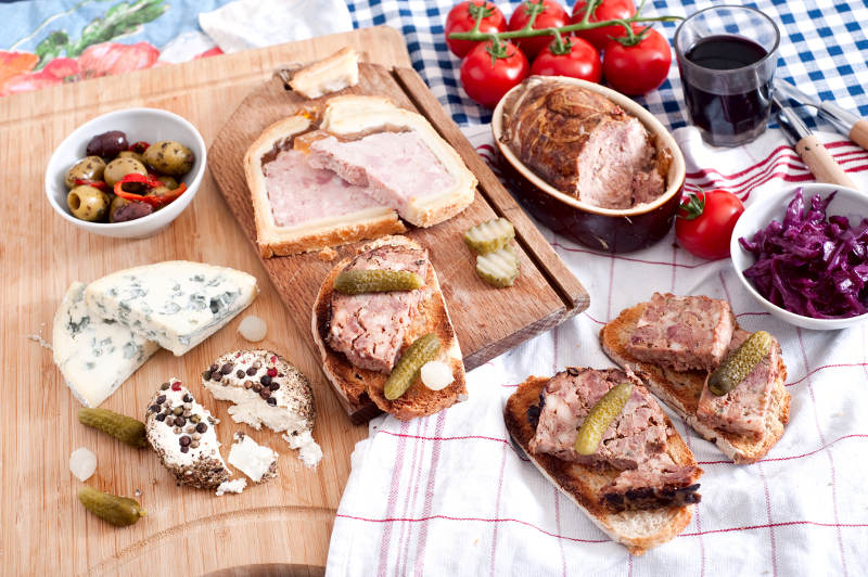 french food on table from above, pate, terrine, bread