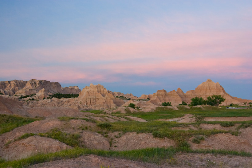 pink hued rock formations badlands national park south dakota