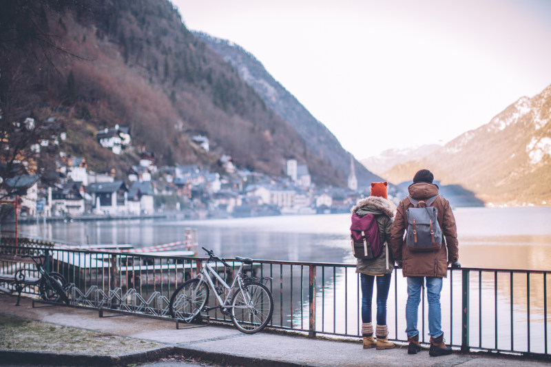 couple look out ver water in Austria