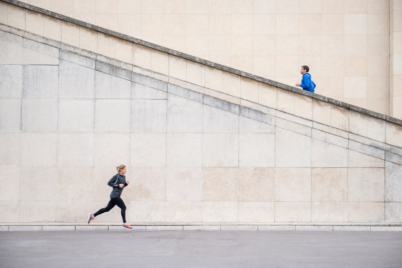 runners running up staircase