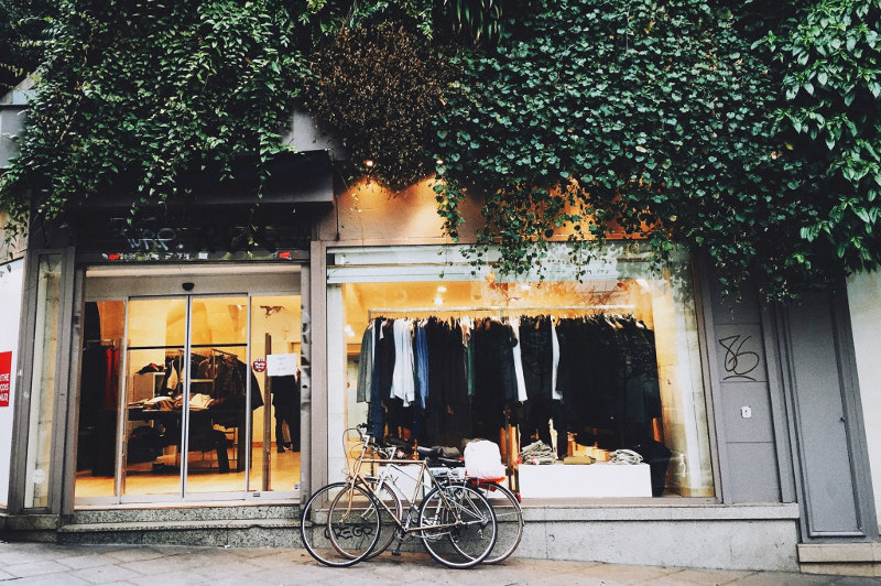 Outside windows of Paris boutique with bikes resting against window
