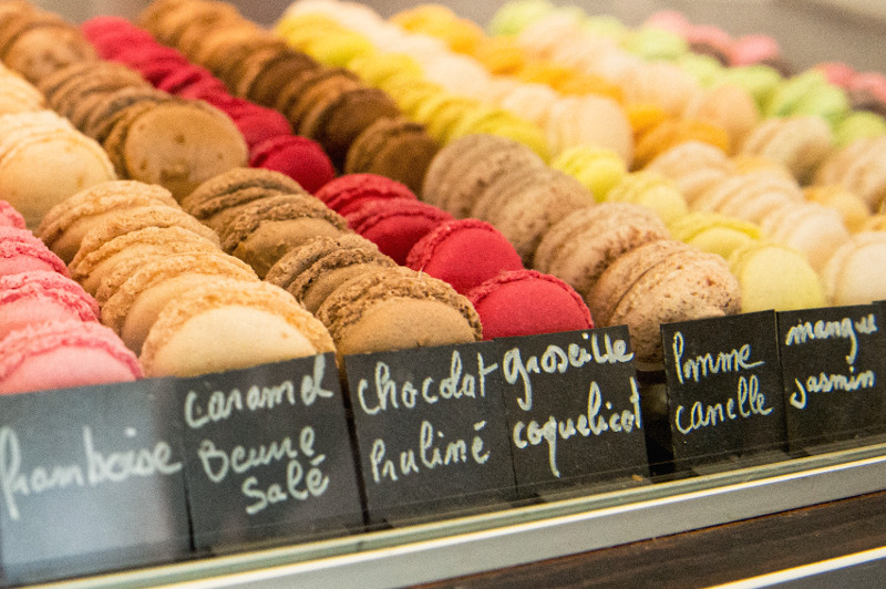 macarons in a parisian bakery window
