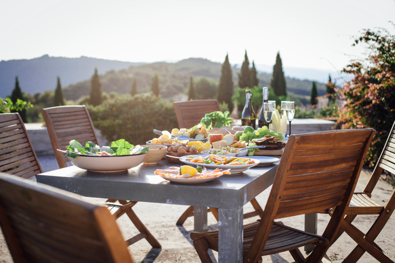 Table set for outdoor meal in Tuscany Italy