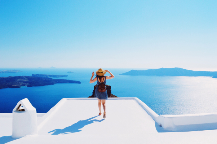 Girl in white village in greece