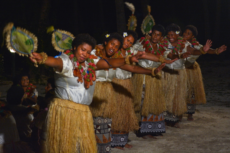 Fijian women performing the traditional Meke fan dance.