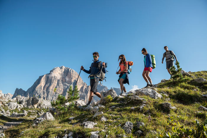 group hiking in mountains