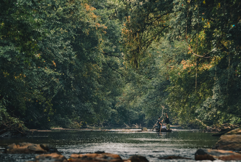 boat of people on river in Nicaraguan wilderness