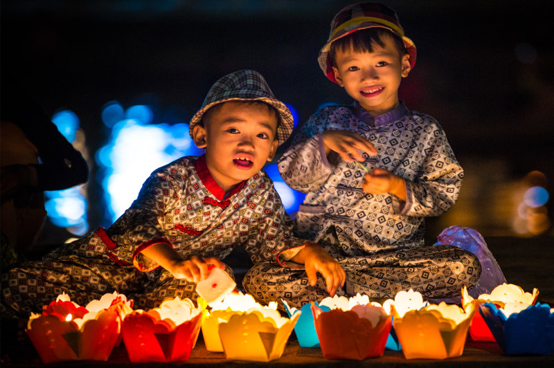 Young boys with lanterns in Hoi An, Vietnam.
