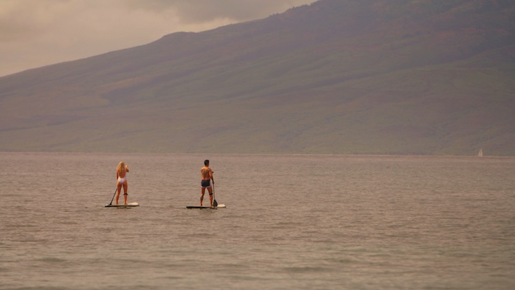Greer and Jason paddle boarding at the Hyatt Regency Maui Resort & Spa during The 48 Hour Destination: Hawaii.