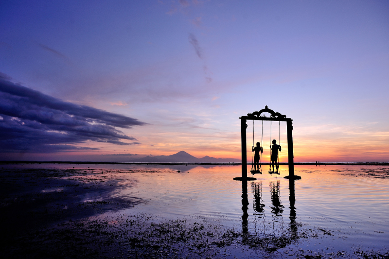 beautiful beach at sunset in Gili Islands.