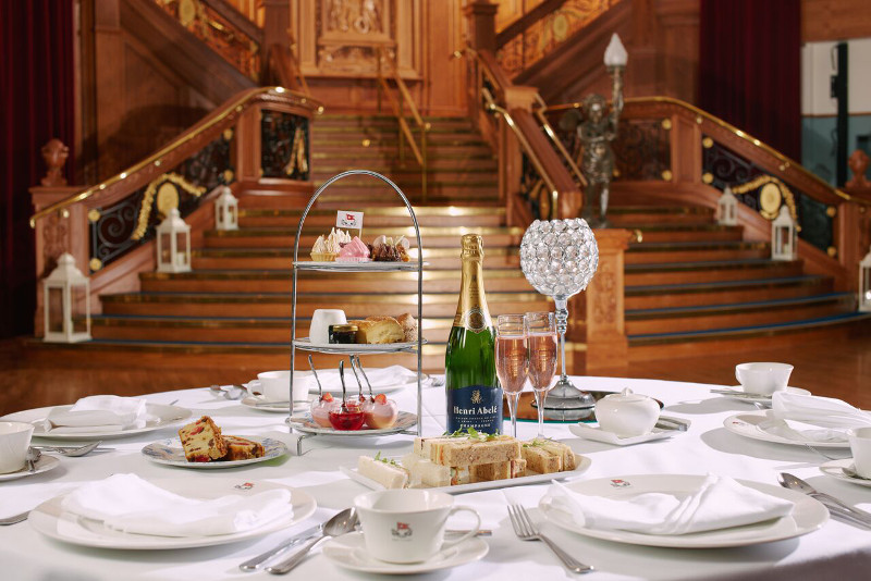 Afternoon tea in front of staircase