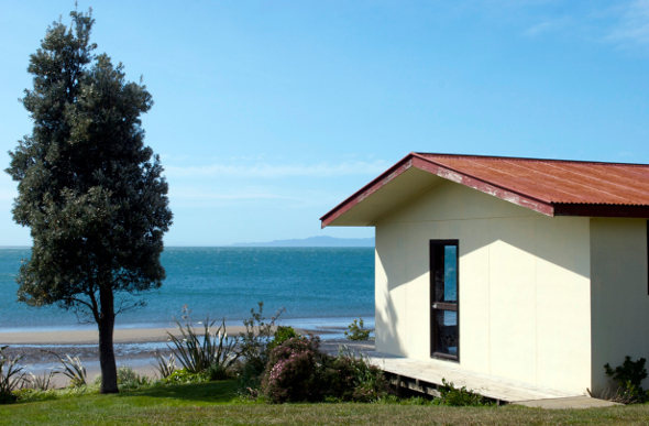 A beachside hut, or bach, in New Zealand.