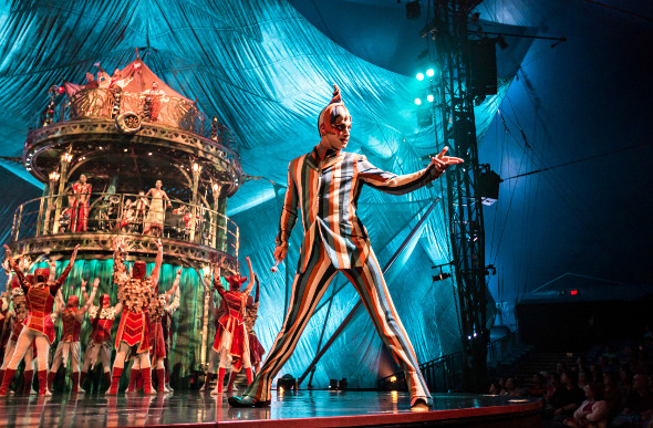 The Trickster characters performs in the opening Charivari scene of Kooza.
