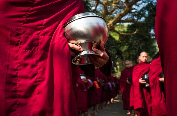 Buddhist monks in alms giving ceremony