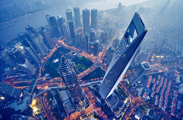 An aerial view of towering skyscrapers in Shanghai, China.