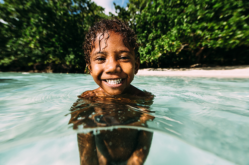 A young boy from Vanuatu in the water