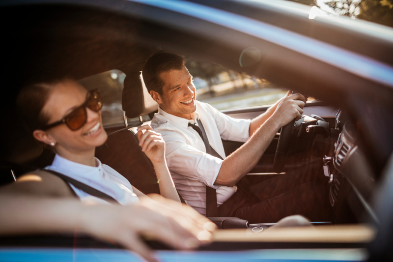 Two people riding in a car