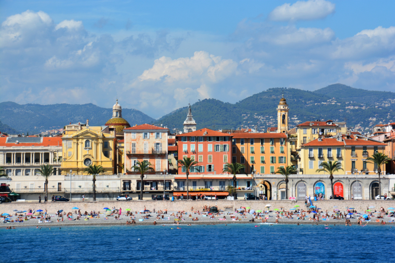 Image taken from the ocean looking back at Nice Beach in France. Buildings in the background
