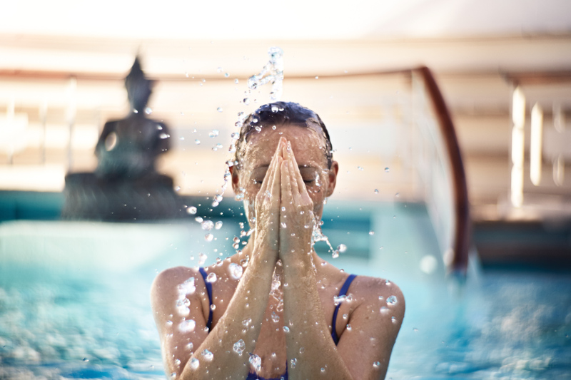A woman takes a dip at The Sanctuary adults-only retreat with Princess Cruises.