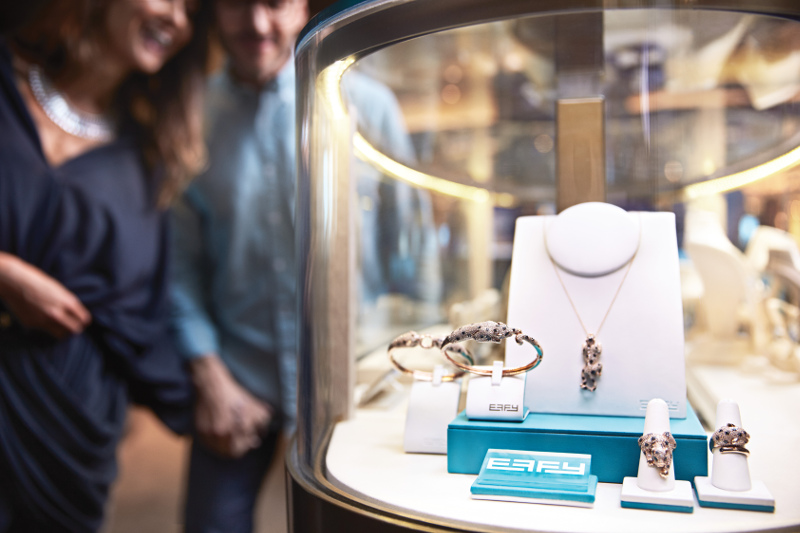 A woman admires some jewellery on board a Princess cruise.