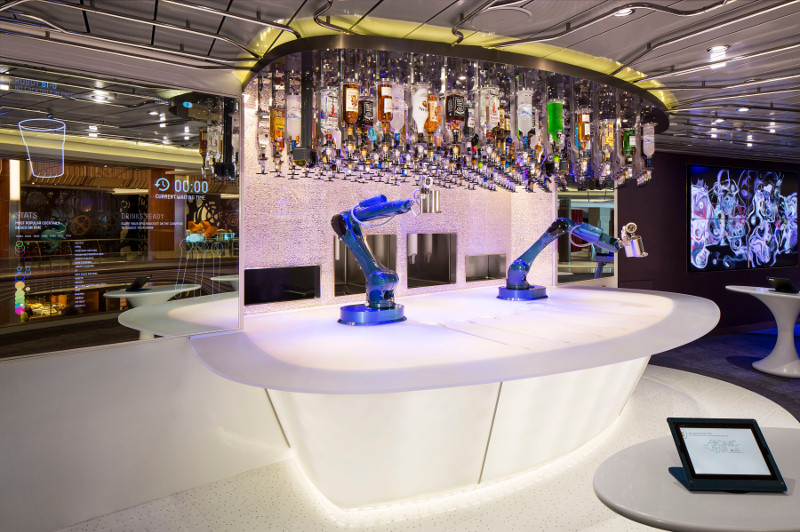 Robots serve drinks at Bionic Bar on board the Anthem of the Seas cruise ship.