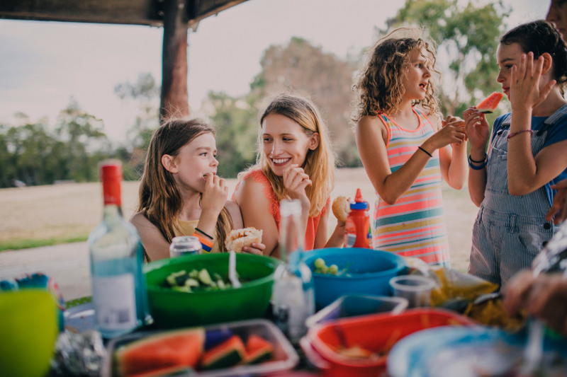 family at park for a barbecue