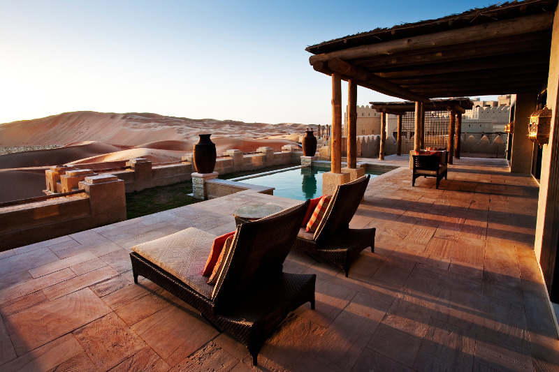 loungers overlooking pool luxury getaway in desert loungers overlooking pool luxury getaway in desert