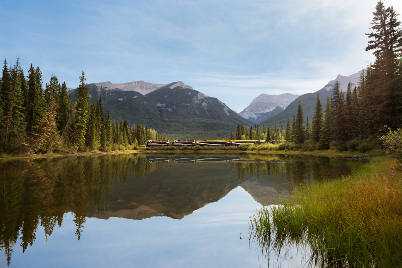 The Rocky Mountaineer train in front of a lake