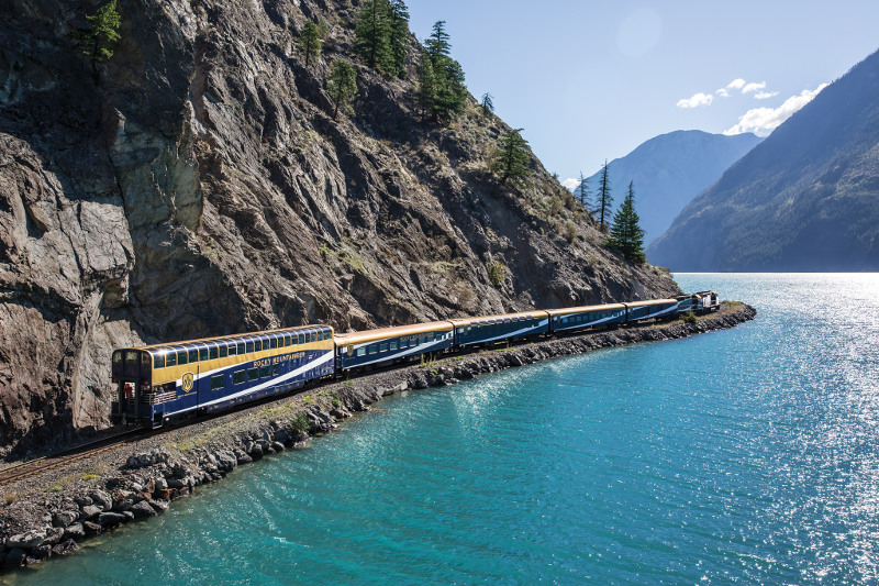 The Rocky Mountaineer running along the water's edge