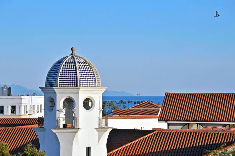 A view over red-tiled roofs to the sea in Santa Barbara.
