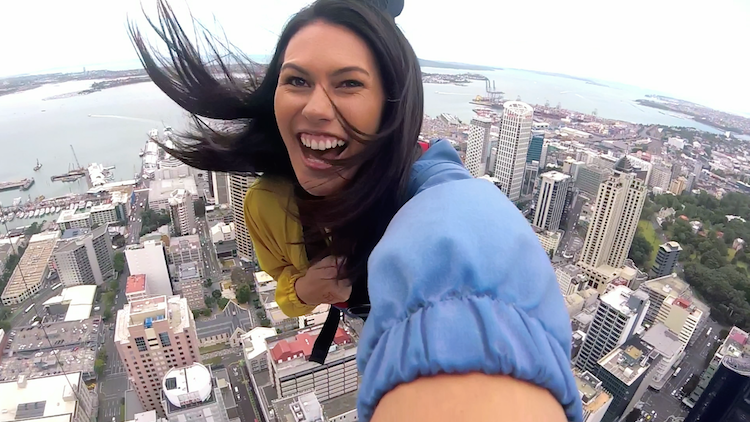 Flight Centre consultant Jamie jumping from the Sky Tower.
