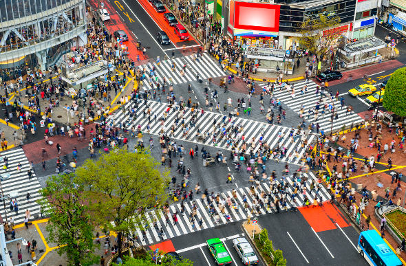 Crowd of people crossing the Shibuya Crossing in Tokyo