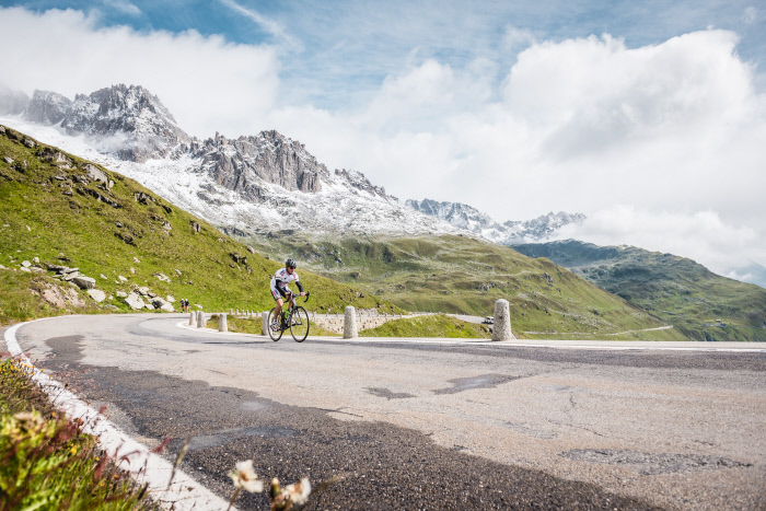 Follow in the path of cycling legend Bruno Risi, pictured here shortly before the Furka summit. Image: Switzerland Tourism.