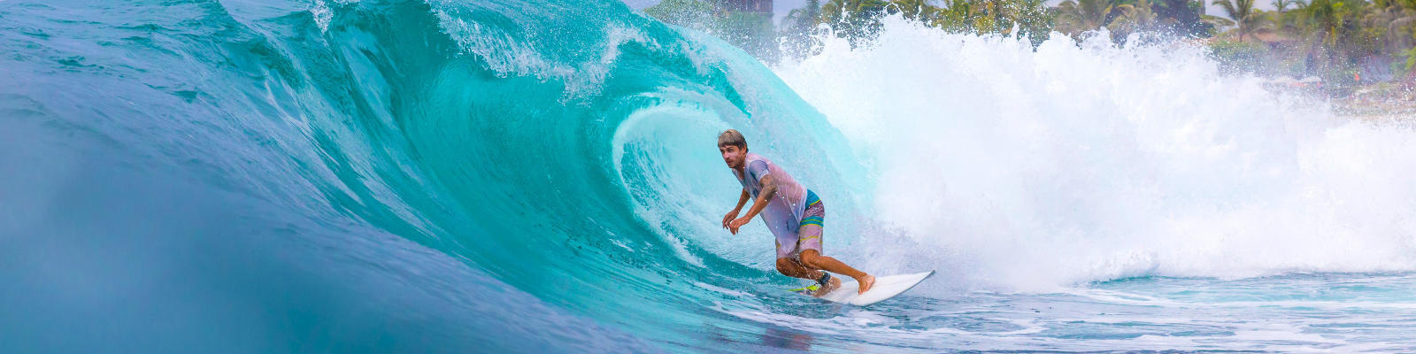 Bali surfer on waves.
