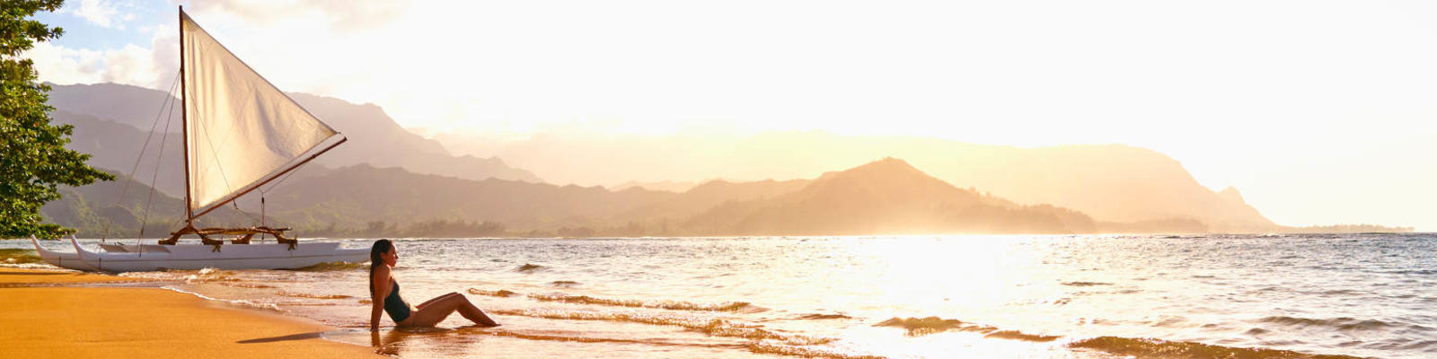 woman on beach at sunset