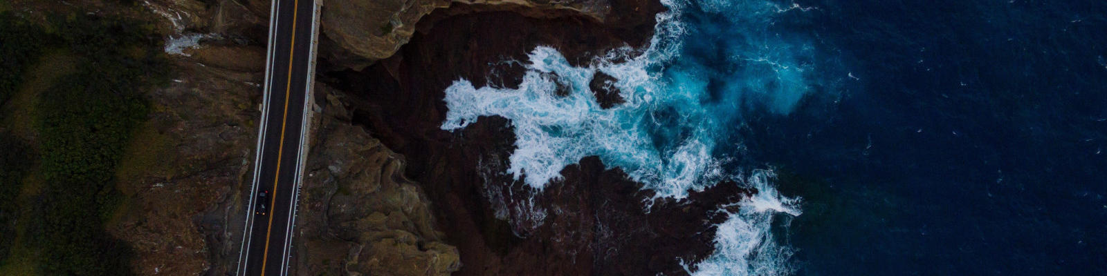 road along volcanic coastline hawaii
