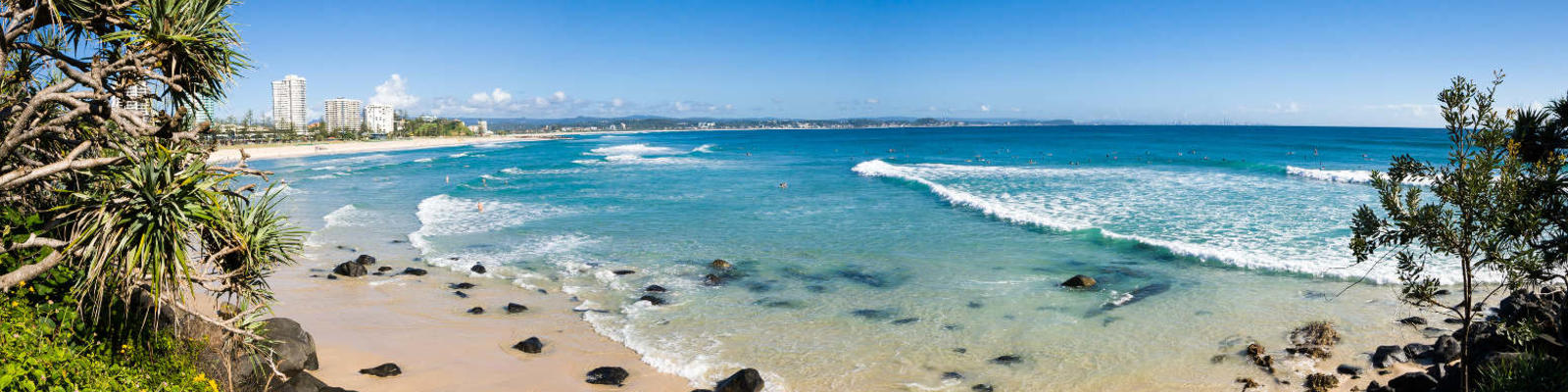 Family on the beach on the Gold Coast, Australia.