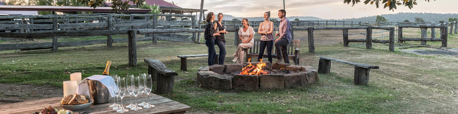 group around fire pit spicers hidden vale