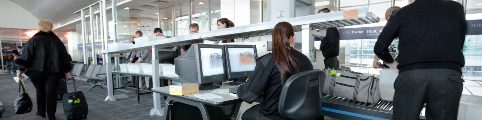 A behind the scenes action shot of customs workers at their job