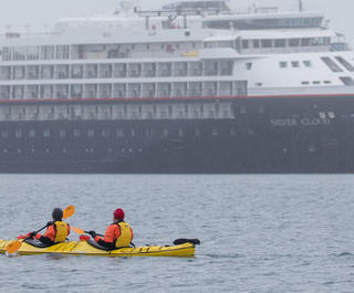 silversea silver cloud with kayakers