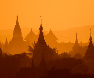 A golden sunset over the temples of Bagan in Myanmar.