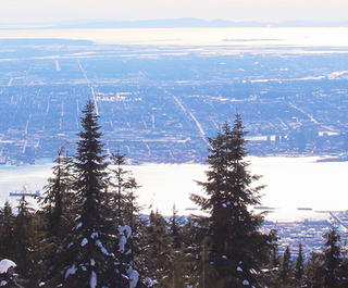 Vancouver City from the Skyride gondola on Grouse Mountain