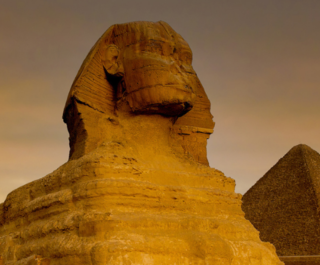 The Great Sphinx and Giza Pyramids in the twilight