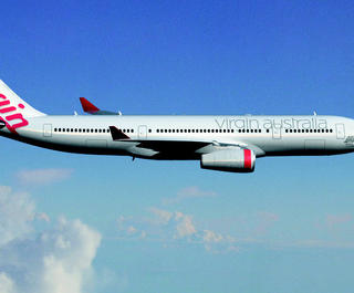 Virgin Australia plane in the sky.