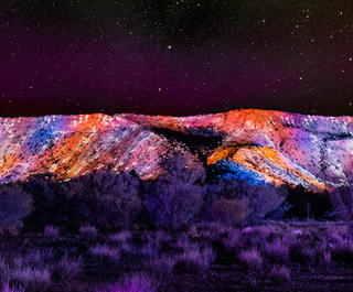 MacDonnell Ranges illuminated during the Parrtjima: Festival in Light in the Northern Territory.