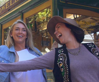 Two women on a streetcar in San Francisco.