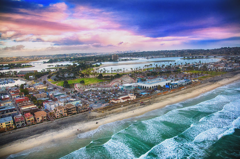 An aerial view of San Diego as the waves roll in.